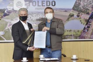 PERMUTA DE REAS ENTRE PREFEITURA DE TOLEDO E SICREDI  SACRAMENTADA